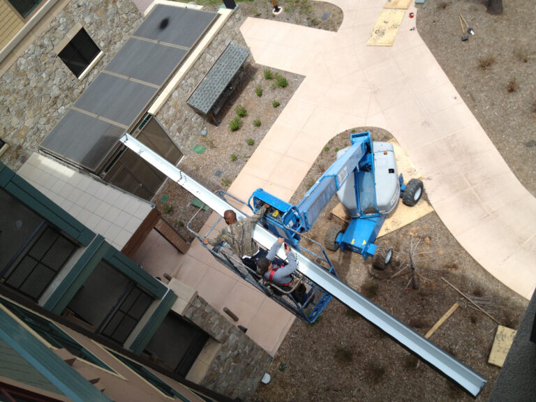 crane loading roofing material in truckee ca